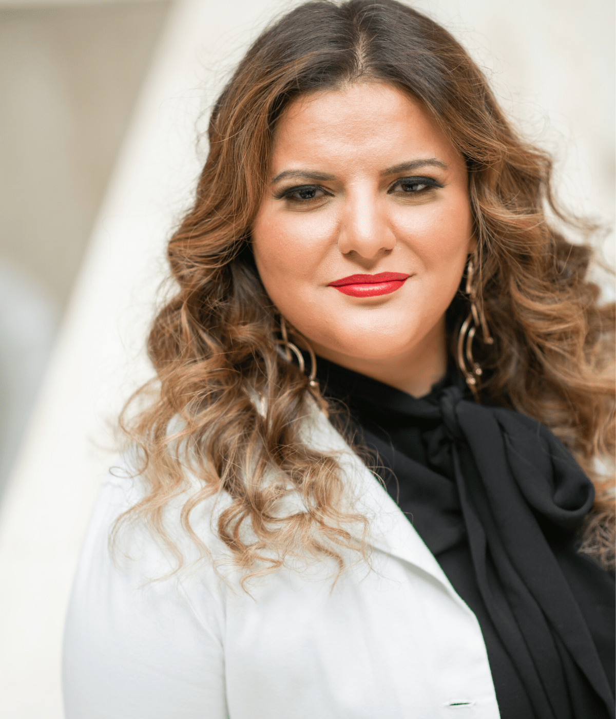 Dr. Dia Smiley in a white doctor coat